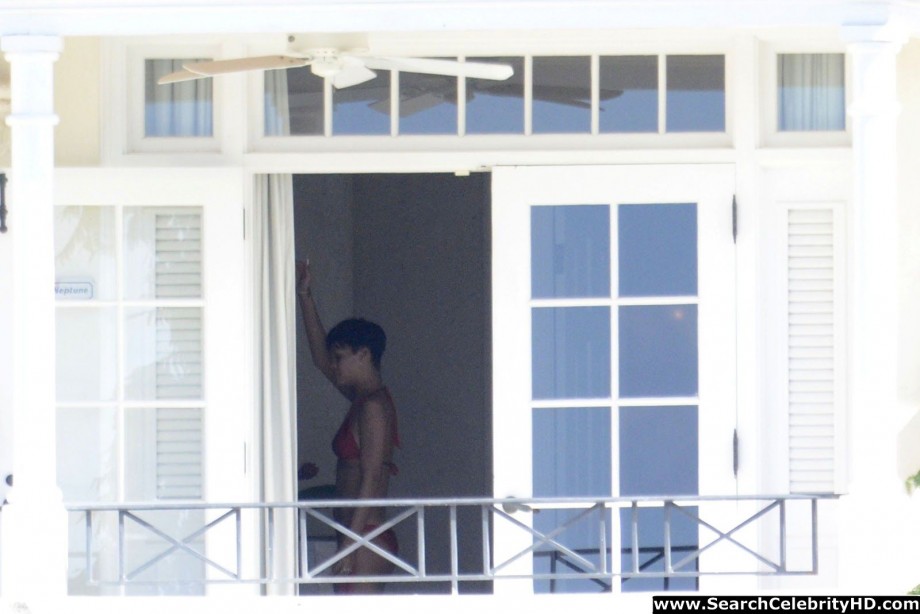 Rihanna naked ass and topless boobs candids through her balcony window - celebrity