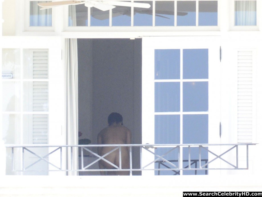 Rihanna naked ass and topless boobs candids through her balcony window - celebrity