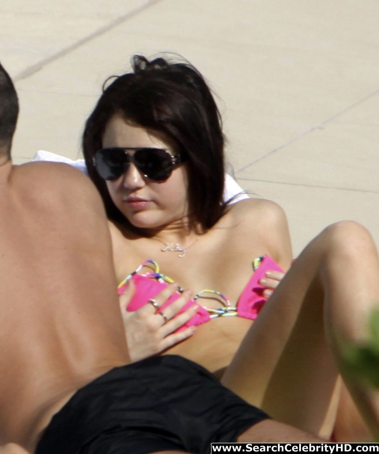 Miley cyrus - bikini candids at the fontainebleau hotel in miami - celebrity