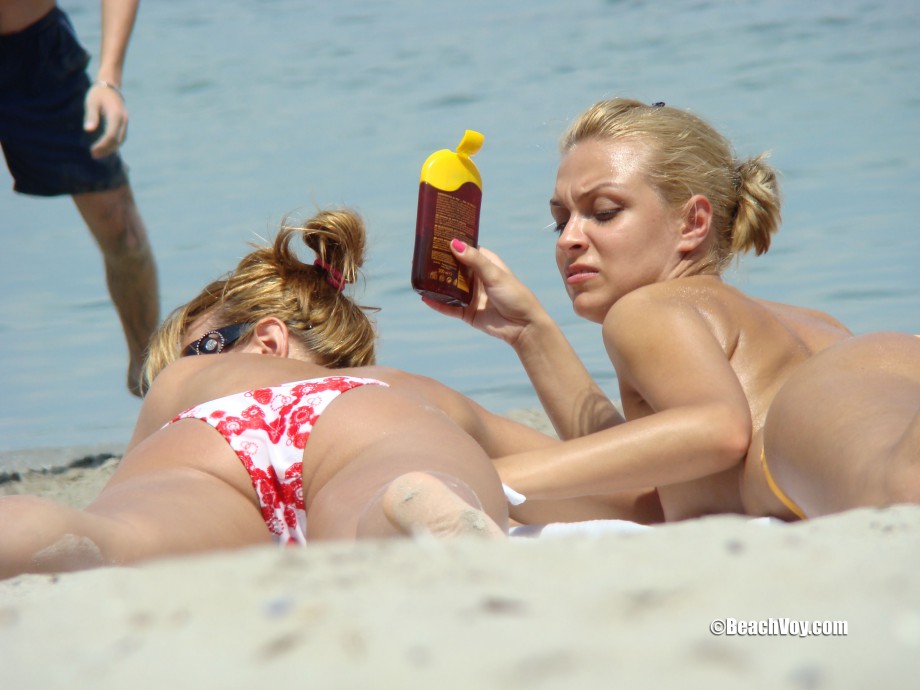 Topless girls on the beach - 184