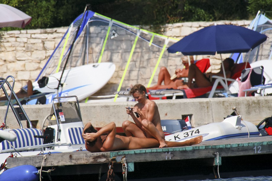 Nudist horny couple taking pictures