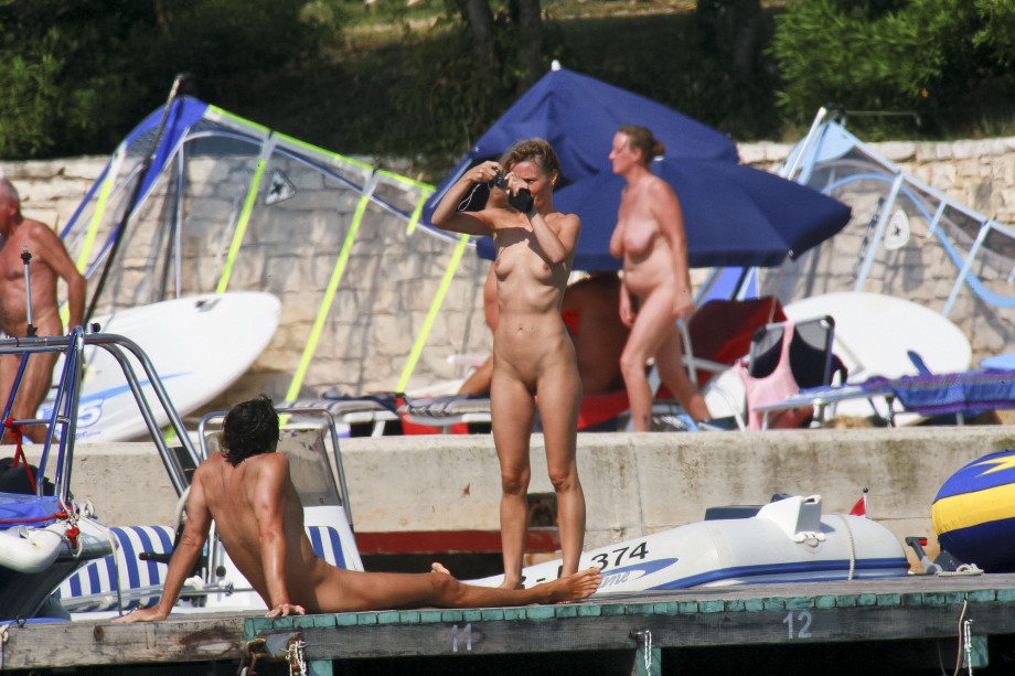 Nudist horny couple taking pictures