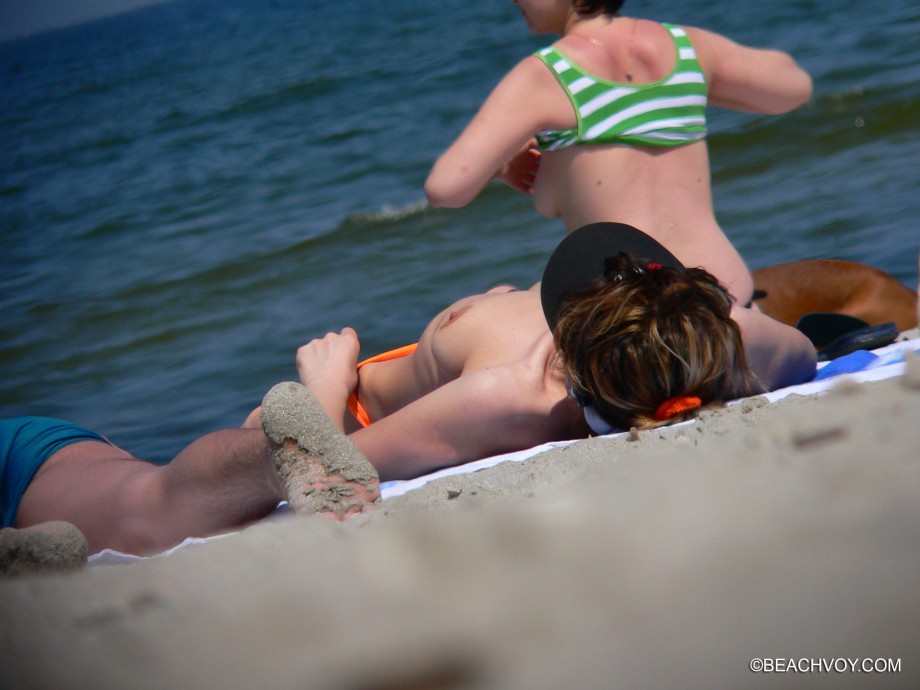 Topless girls on the beach - 203